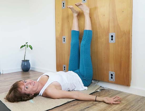 legs up the wall restorative yoga pose