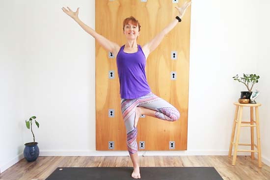 Example of tree pose with arms overhead