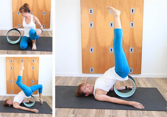 yoga wheel poses: shoulder stands