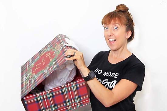 woman opening gift box