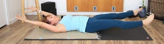 Banana abdominal exercise. Lying supine with arms and legs lifted slightly away from floor.