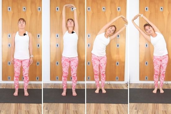 Woman in white tank top and pink paisley pants performing yoga poses