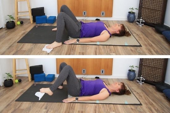 yoga teaching lying on grey yoga mat with knees bent