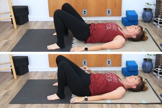 yoga teacher on a yoga mat